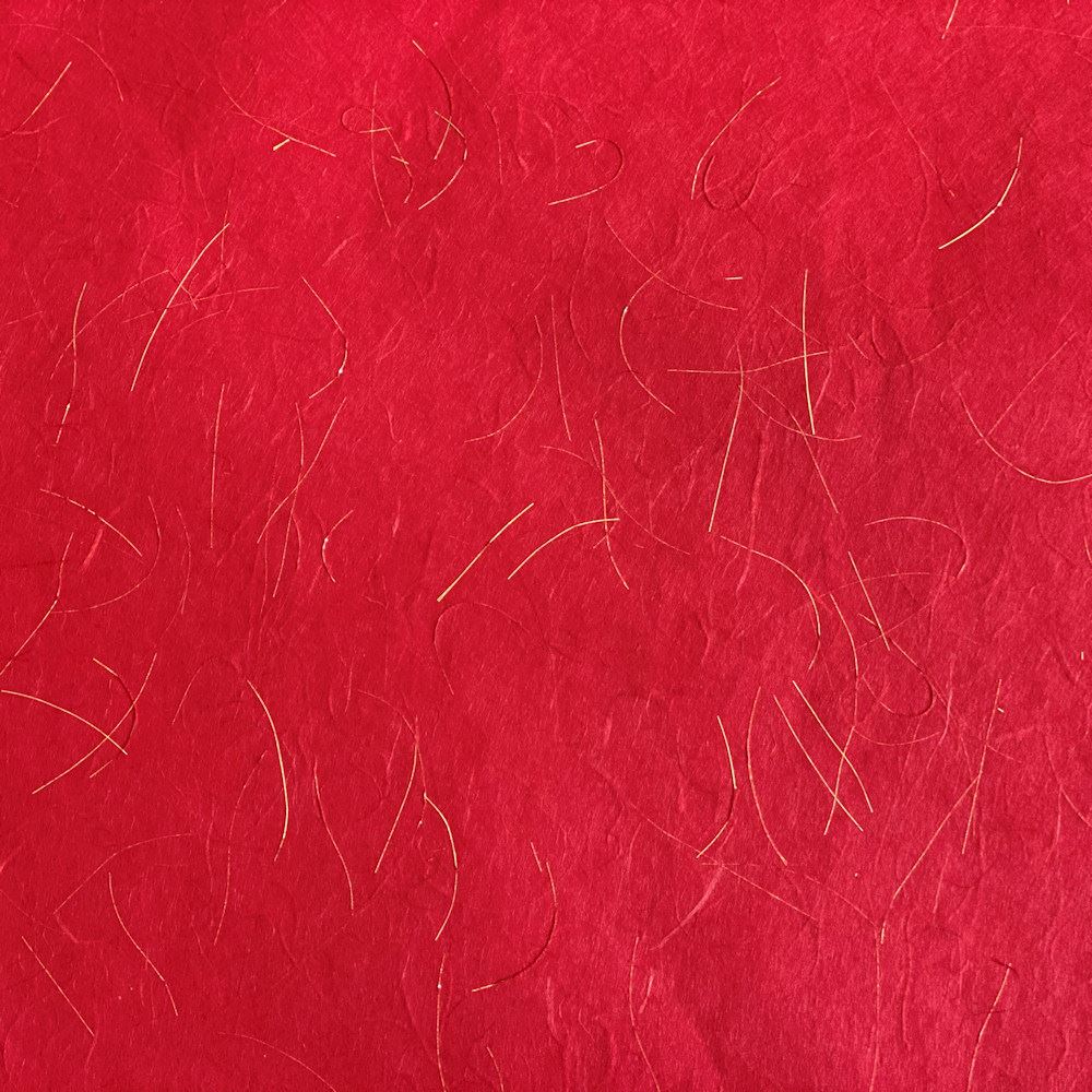 Carta Silk Rossa con fili color oro